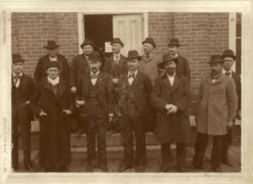 Group portrait in front of the old courthouse